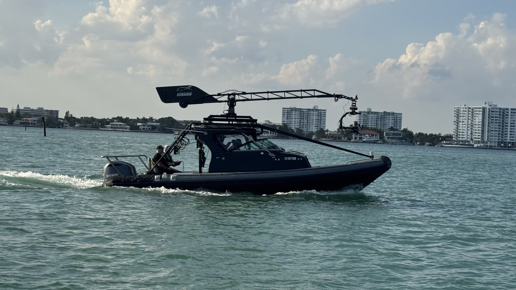 Clean broadside of the Basilisk crossing Miami waterways